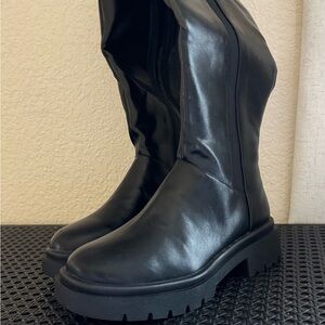 Tall Black Boots with Rugged Soles